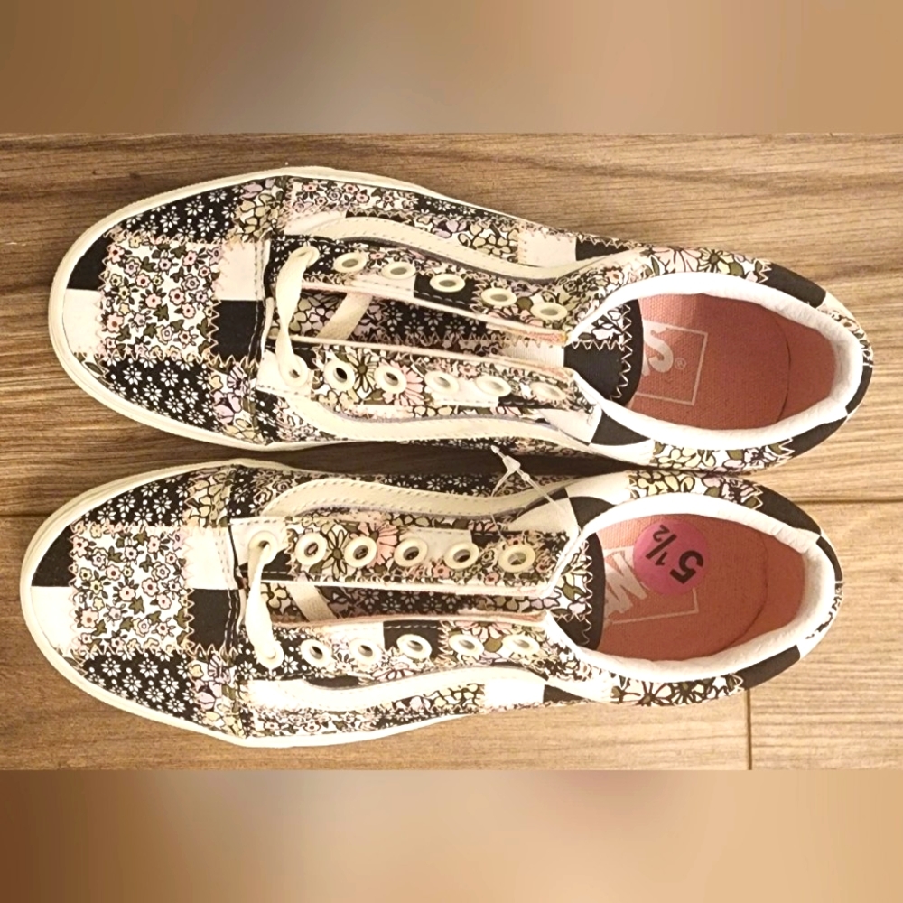 Vans size 5.5 flower power over checkered pattern. Design in patch work style.